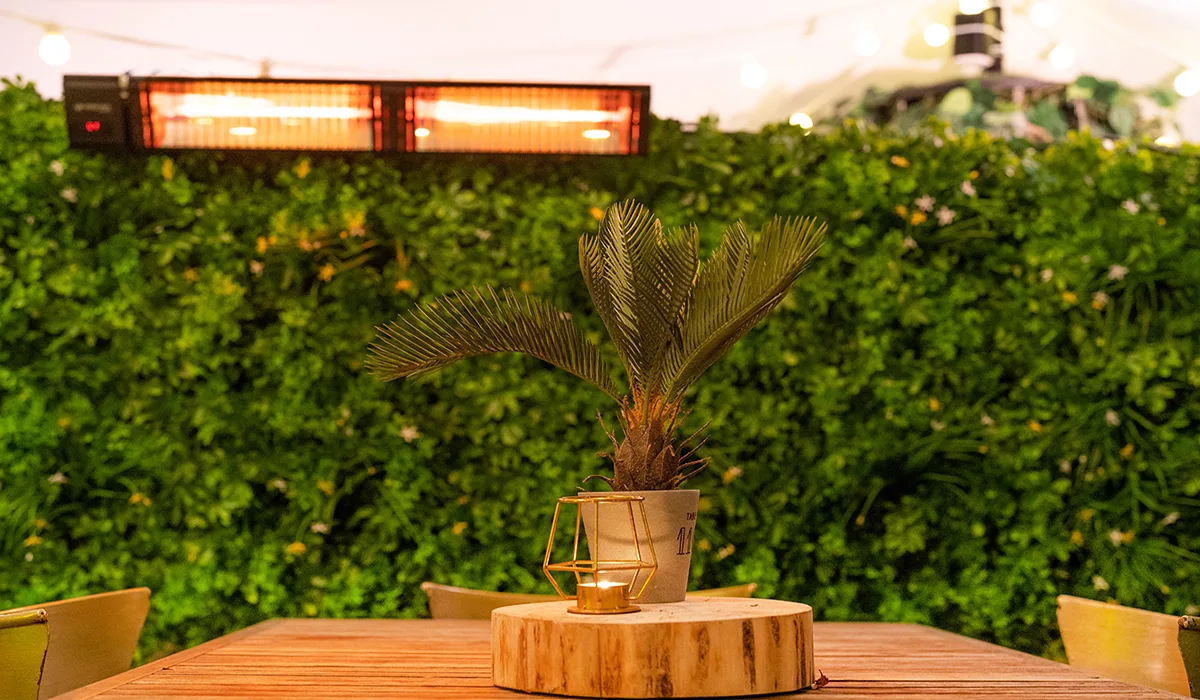 Manhattan patio heater in outdoor garden bar